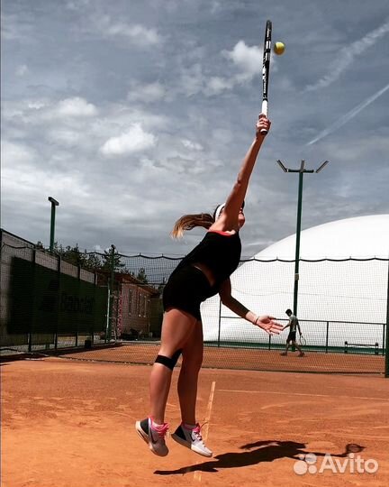 Тренер по большому теннису