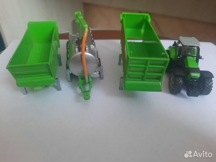 Трактор с различными прицепами к нему
