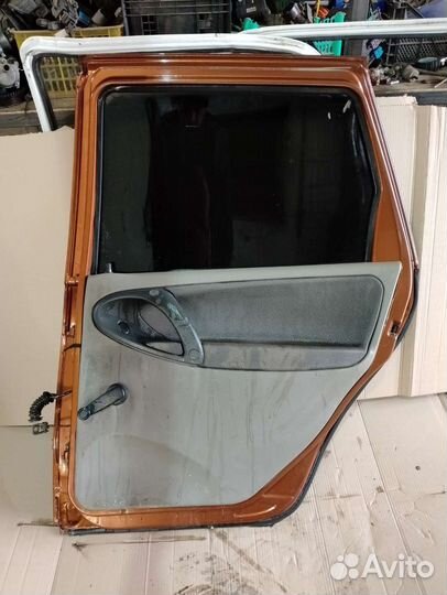 Дверь задняя правая калина