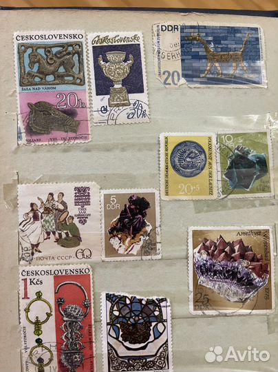 Марки почтовые разных стран в книге