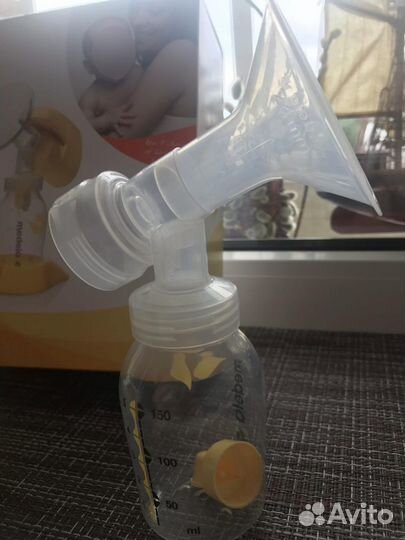 Молокоотсос medela электрический
