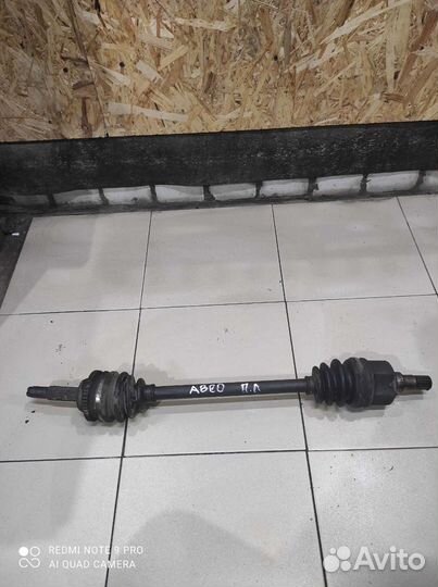 Привод, полуось левый Chevrolet Aveo 1.2