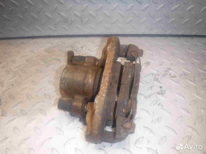 Суппорт тормозной передний правый Ford Fiesta