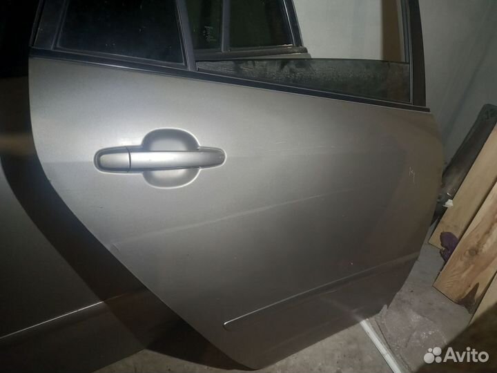 Двери Toyota Corolla Spacio NZE121