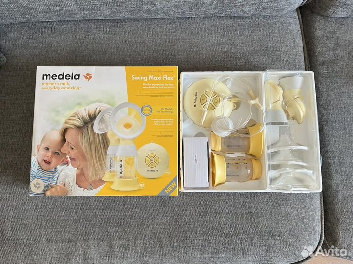 Молокоотсос medela электрический