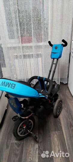Трехколесный велосипед BMW