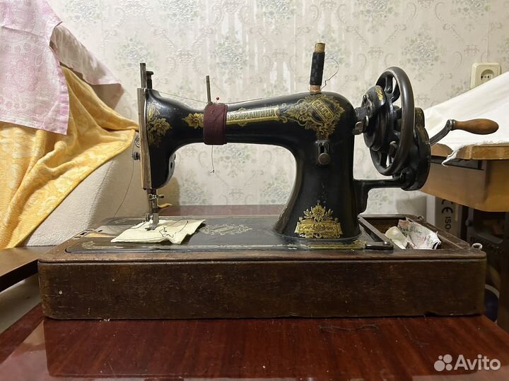Швейная машина зингер