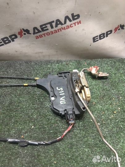 Замок боковой двери передний левый Mitsubishi