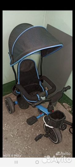 Трехколесный велосипед с ручкой