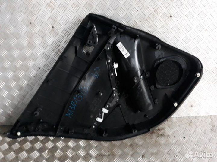 Обшивка двери прав. зад. Mazda 3