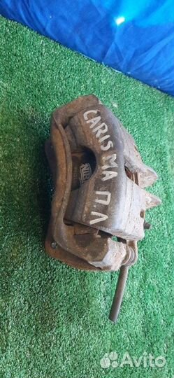 Суппорт тормозной передний левый Mitsubishi