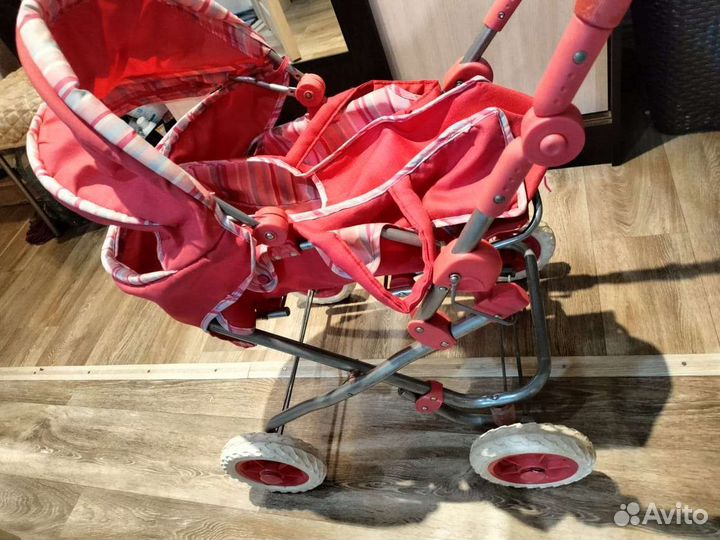 Игрушечная коляска для кукол