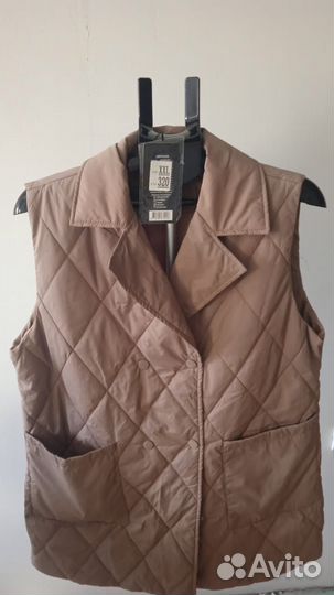 Женская жилетка