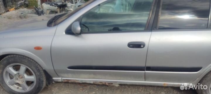 Дверь nissan almera n16