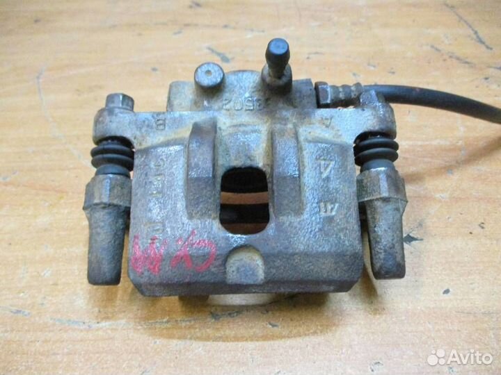 Суппорт задний правый Mitsubishi Lancer 10 (CX, C