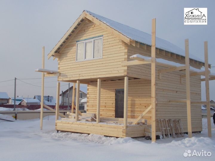 Срубы дома из бруса 6х6 с выносом отделка