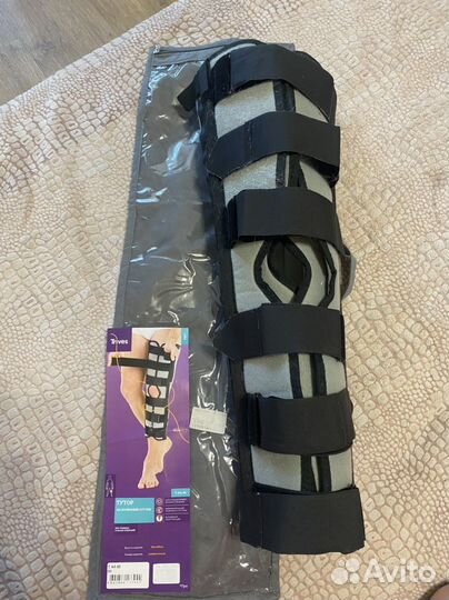 Коленный ортез тутор