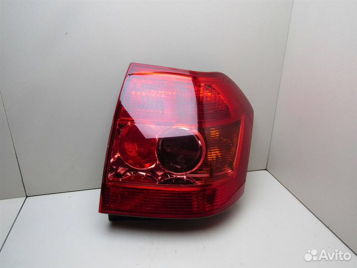 Фонарь задний левый Toyota Corolla E12 2001-2006