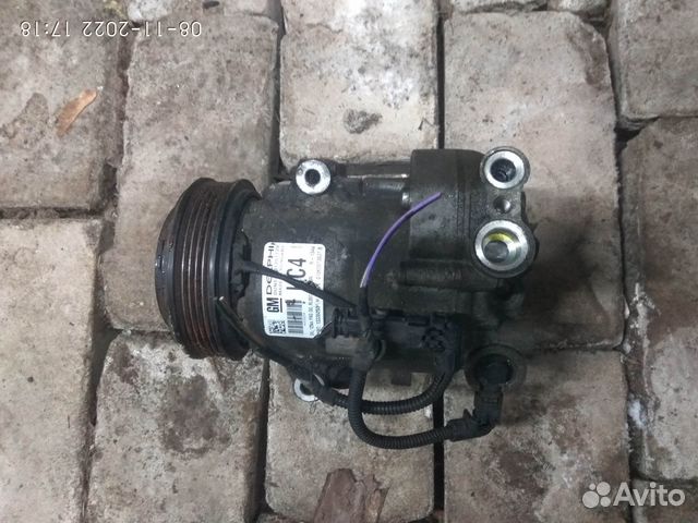 Компрессор кондиционера на Опель Астра J 2014 год