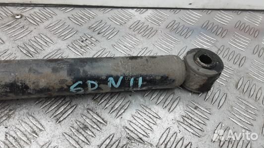 Амортизатор задней балки nissan note E11 (6DN11LX0