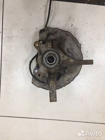 Кулак поворотный передний левый Mitsubishi Lancer