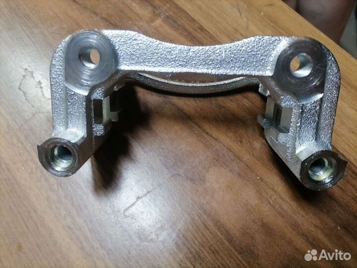 Скоба суппорта заднего solaris kia BC412178