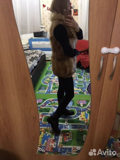 Меховая жилетка