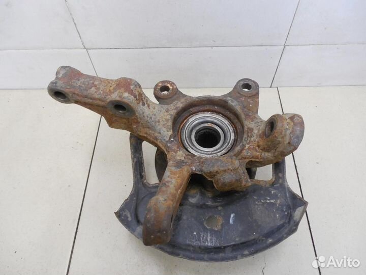 Кулак поворотный передний левый Almera Classic (B1