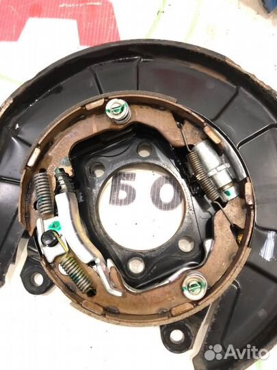 Механизм ручного тормоза задний Mitsubishi Lancer