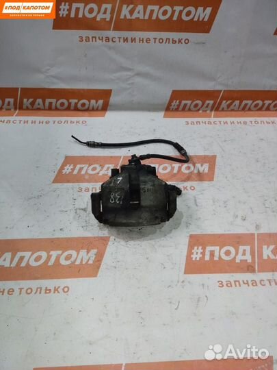 Суппорт тормозной передний левый Volkswagen Eos