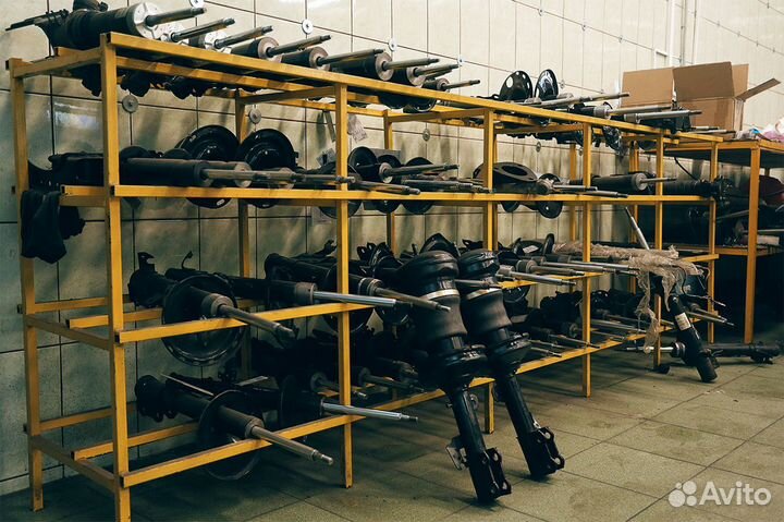 Амортизатор Mazda Familia Перед