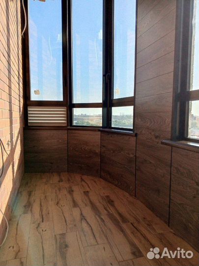 Остекление балкона с отделкой