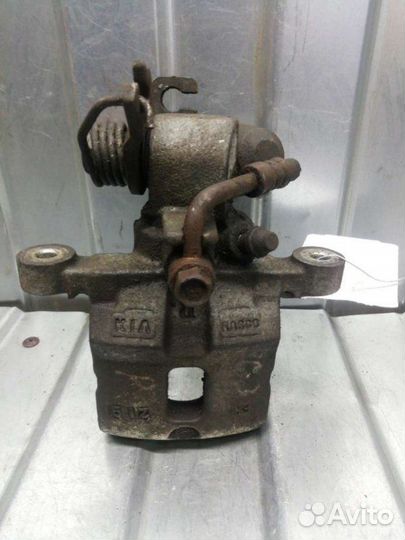 Суппорт тормозной задний правый Kia Picanto 1