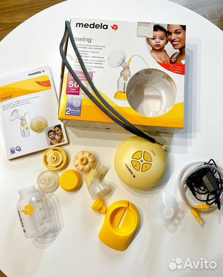 Молокоотсос Medela Swing электрический