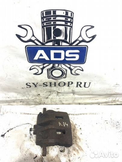 Суппорт тормозной передний левый Ssangyong Actyon