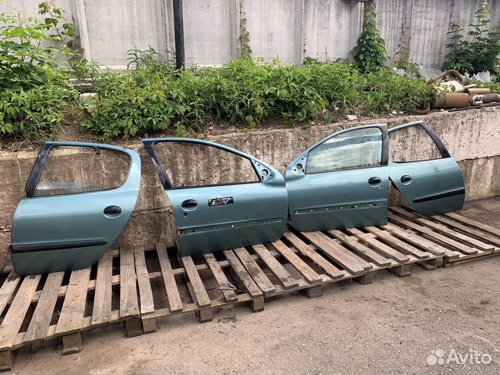 Двери peugeot 206
