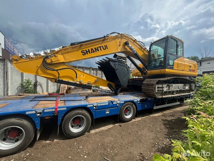 Колесный экскаватор