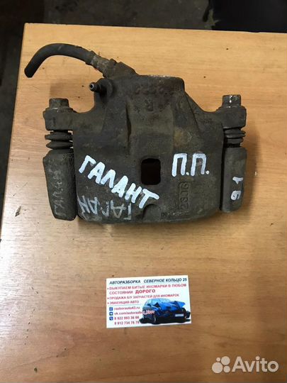 Суппорт передний правый Митсубиси Галант Galant