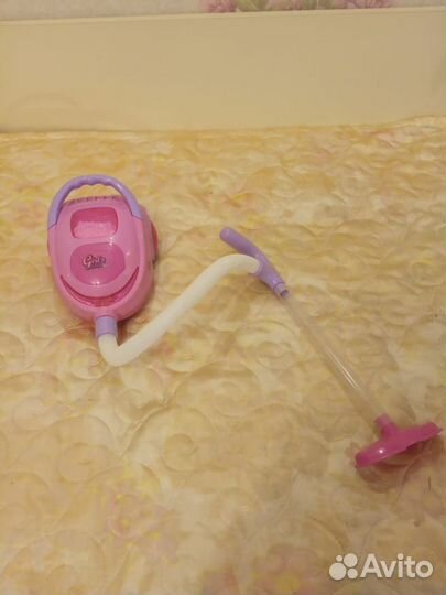 Игрушечный пылесос