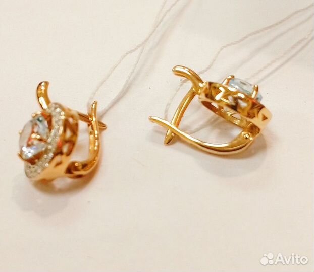 Золотые серьги с камнем