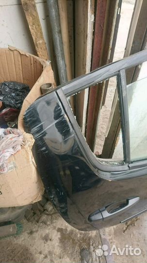 Дверь задняя правая в сборе Митсубиси Л200 L 200