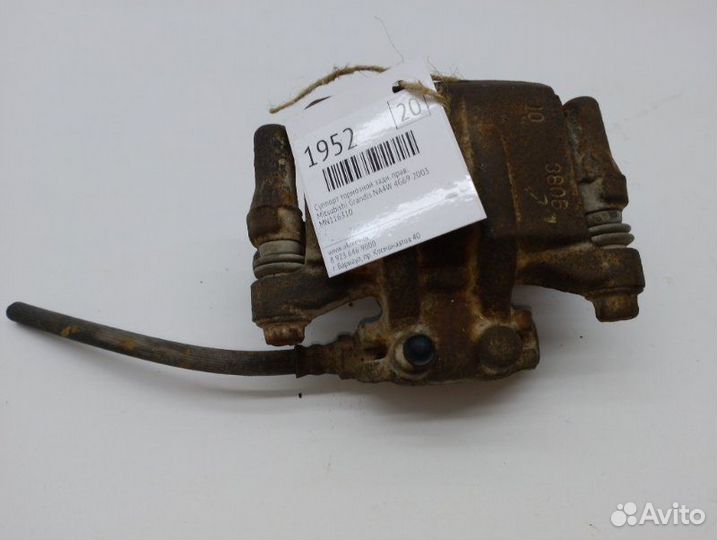 Суппорт тормозной задний правый Mitsubishi Grandis