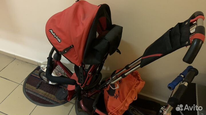 Трехколесный велосипед с ручкой