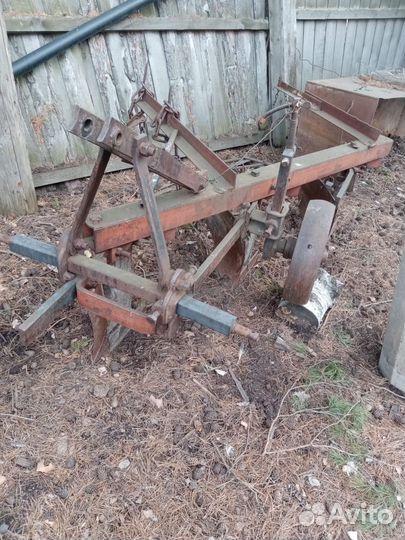 Плуг трехкорпусной