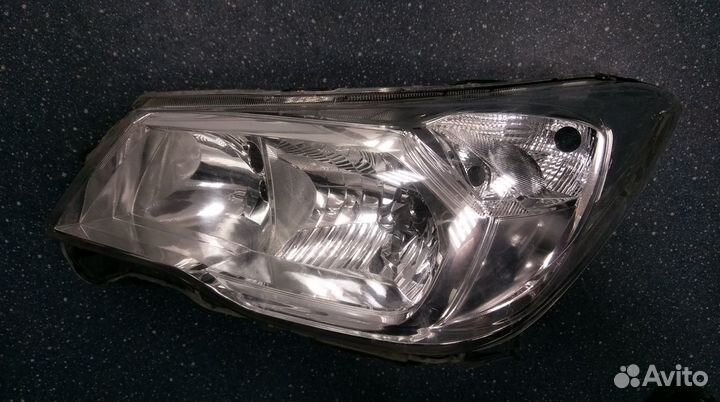 Стекло фары L Forester 2007