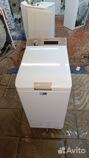 Стиральная машина с вертикальной загрузкой aeg