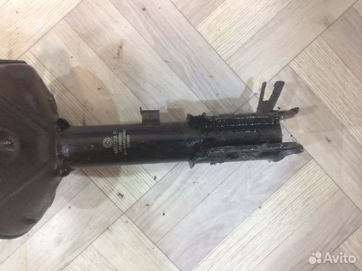 Амортизатор стойка передний правый Geely Mk