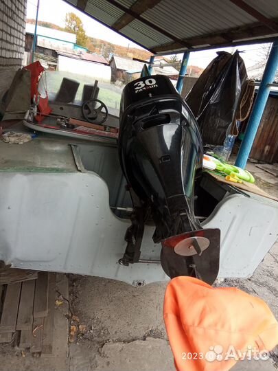 Лодка с мотором и прицепом