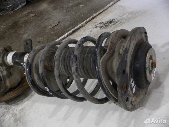 Амортизатор передний левый pegeout 206 1998-2012