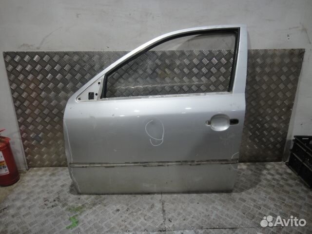 Дверь Octavia Tour (96-11) пер L с дефектом б\у (арт. 1U4831052)
